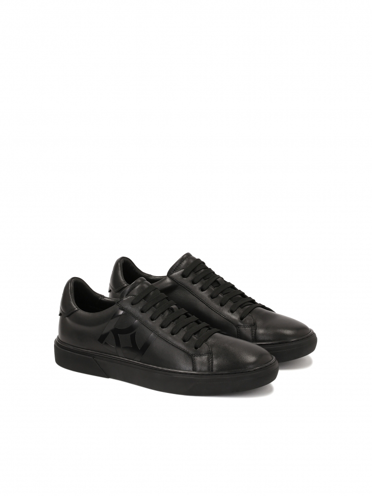 Black sneakers with large KAZAR monogram