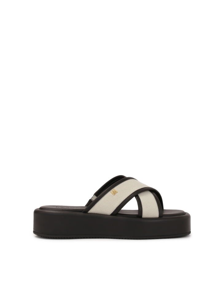Leather slides on a thick sole with cross straps