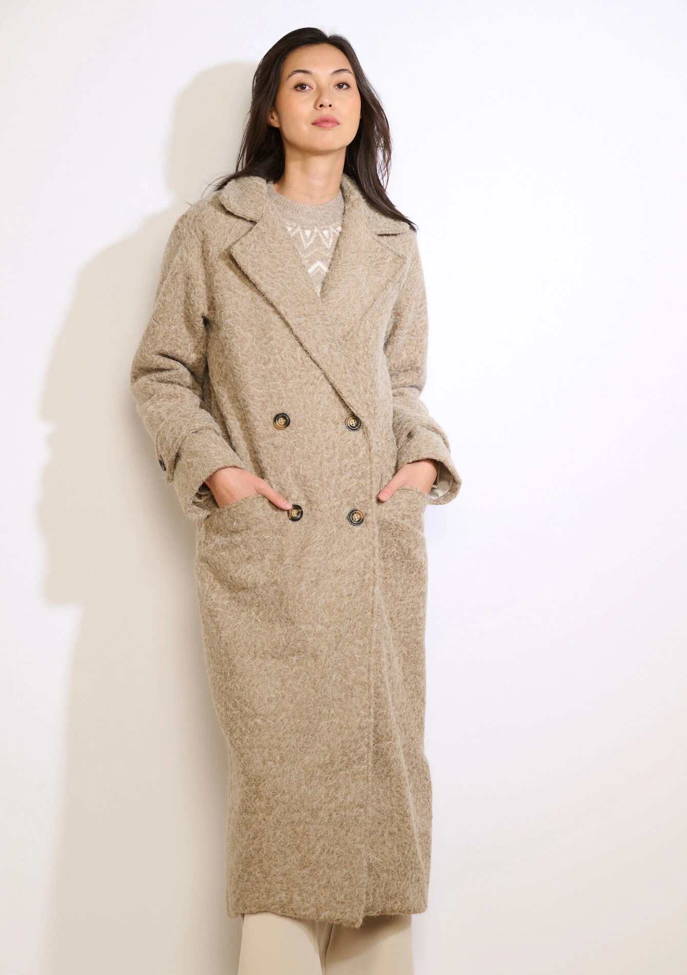 Lange jas met lusstructuur