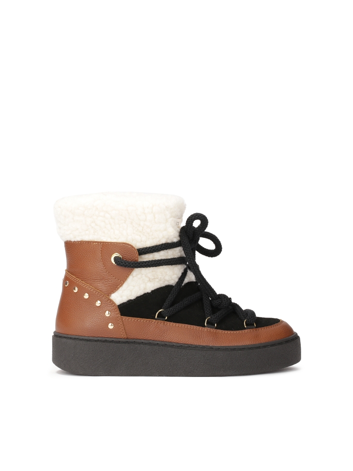 Colorful snow boots made of combined materials