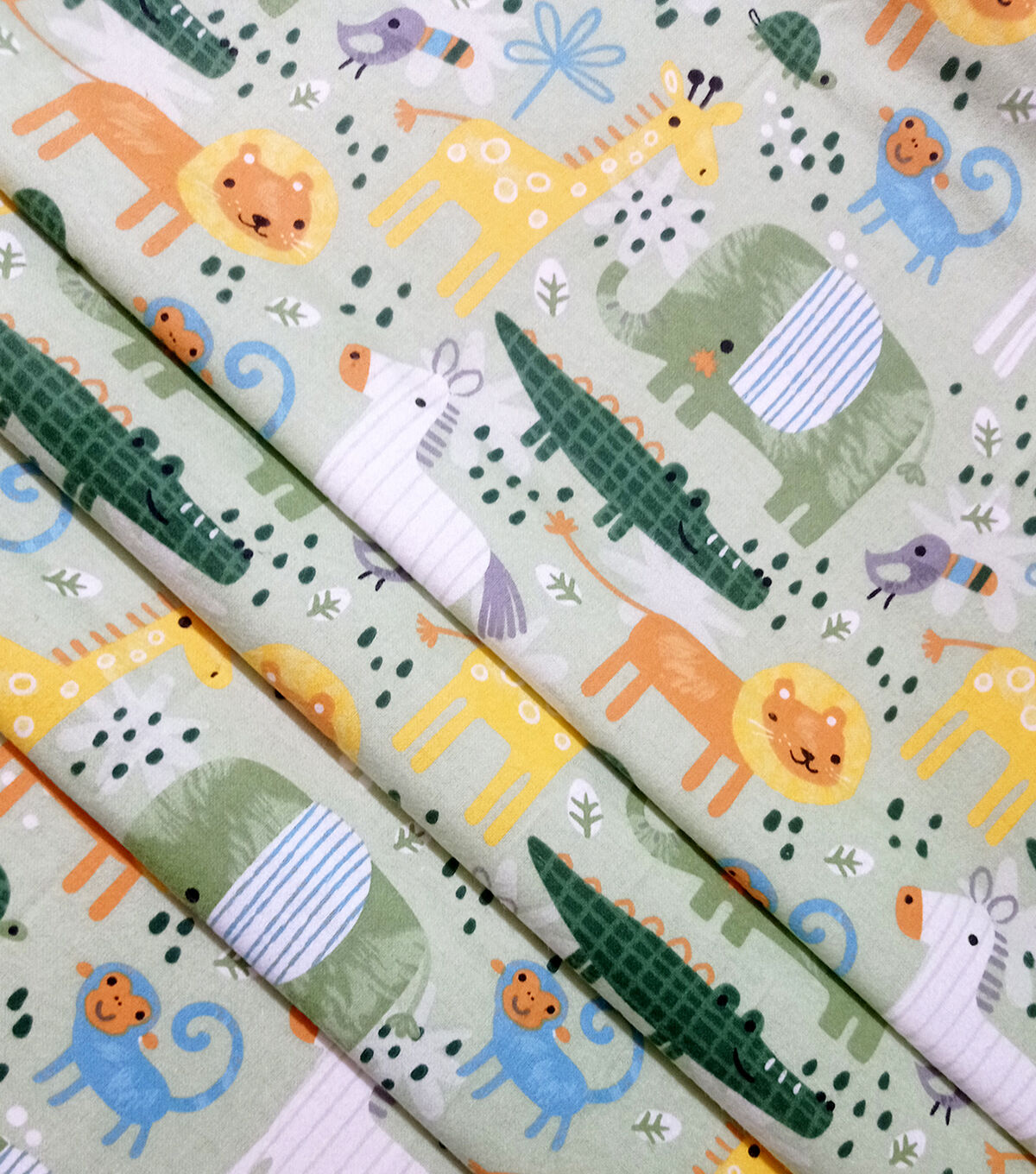 Jungle Animals on Green Super Snuggle Flannel Fabric