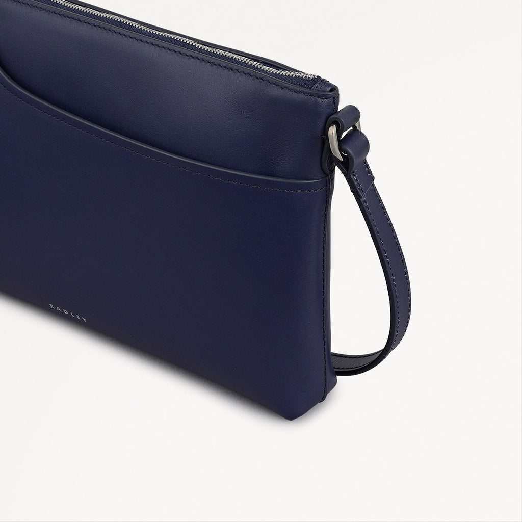 Pockets - Medium Ziptop East-West Cross Body Bag