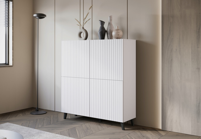 Nowoczesna wysoka komoda 120 cm do salonu, fronty MDF szerokie ryfle białe