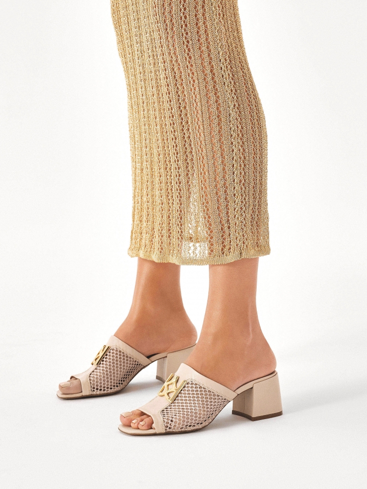 Mules on wide heel with airy mesh material