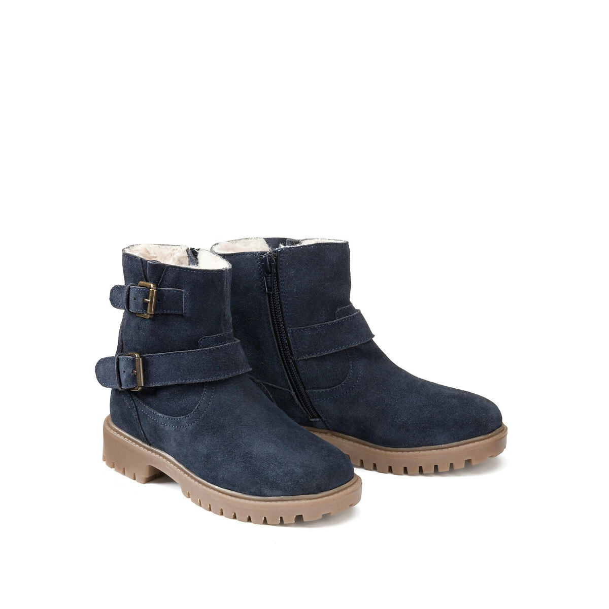 Boots fourrées en cuir à boucles zippées