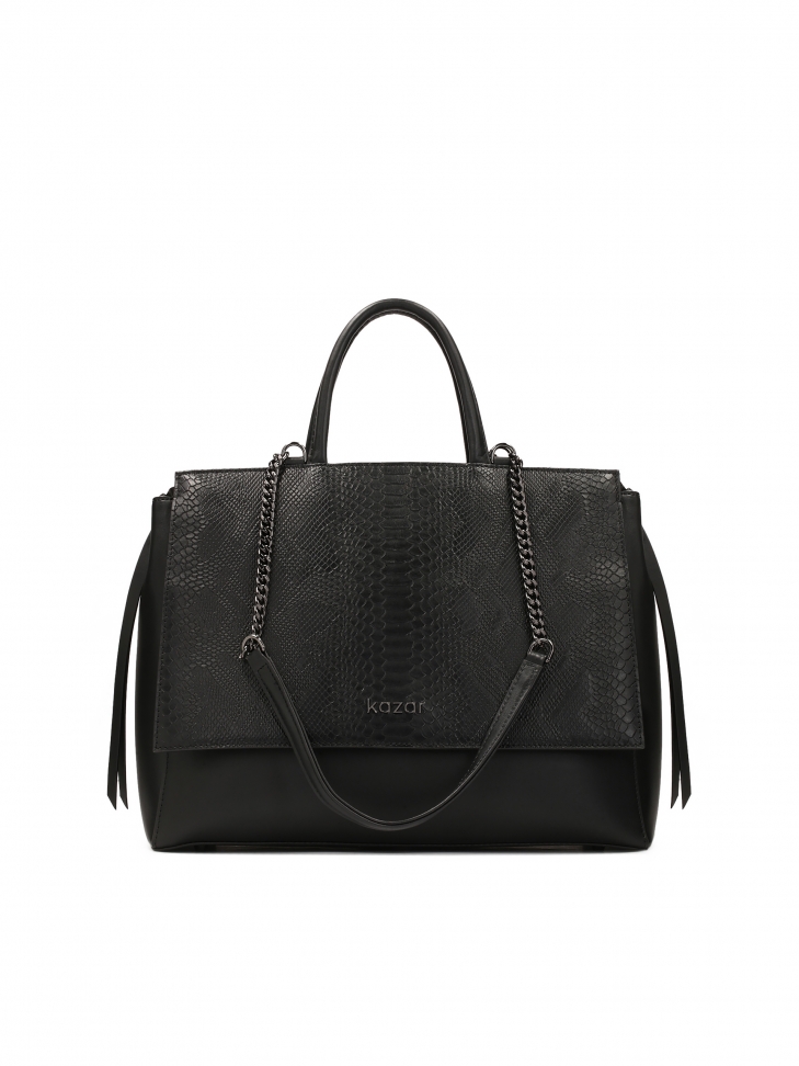 Uniquely shaped handbag with embossed design