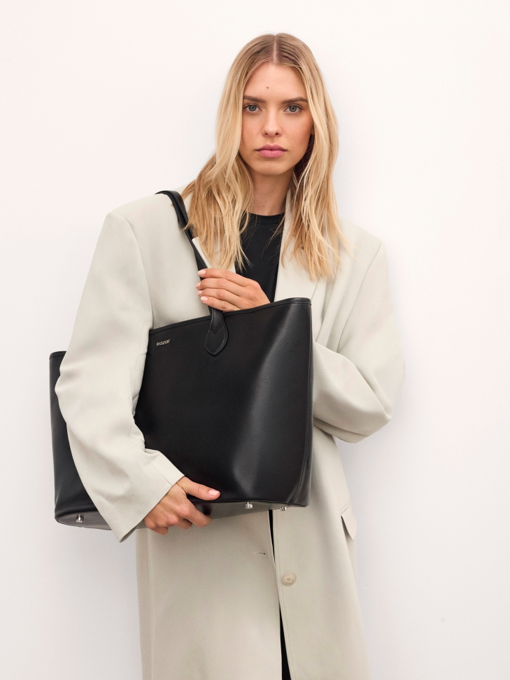 Capacious black shoulder bag