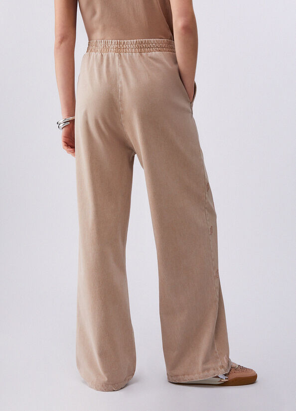 Pantalone in jersey d&eacute;lav&eacute; con strass