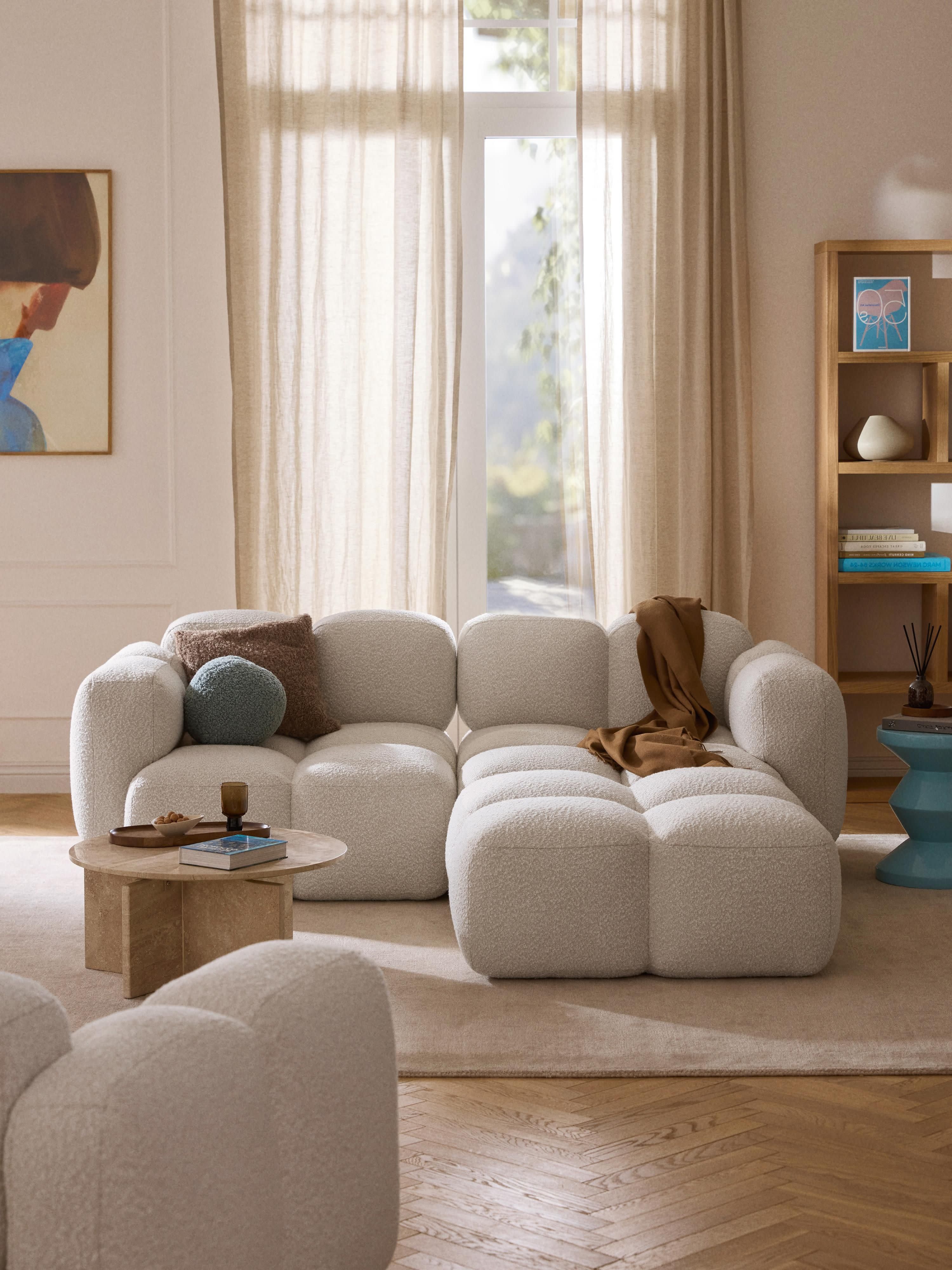 Modulares Sofa Tayla (3-Sitzer) aus Bouclé mit Hocker (links/rechts)