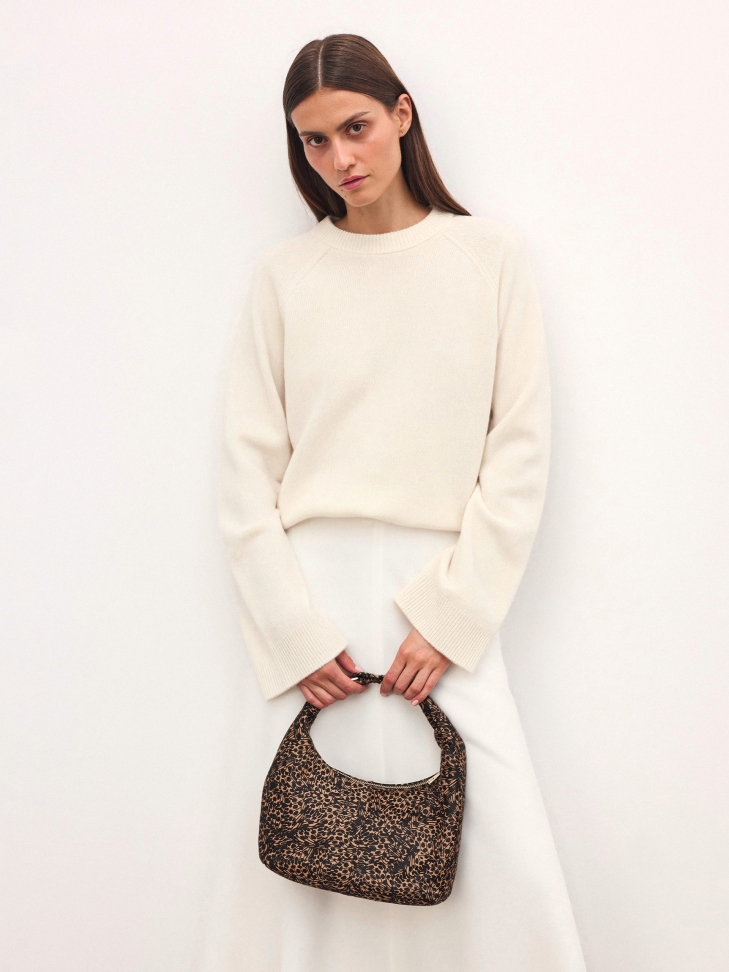 Small handbag with fashionable print bristles