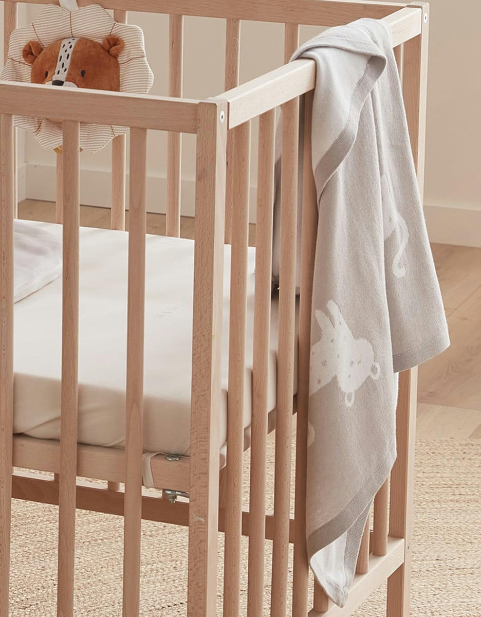 - Couverture 75 x 100 cm en tricot