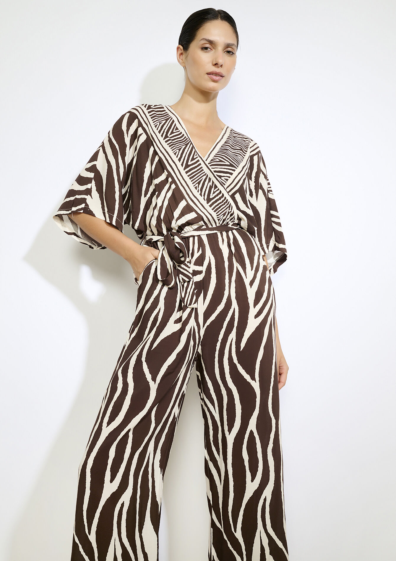 Wikkel jumpsuit met grafische print