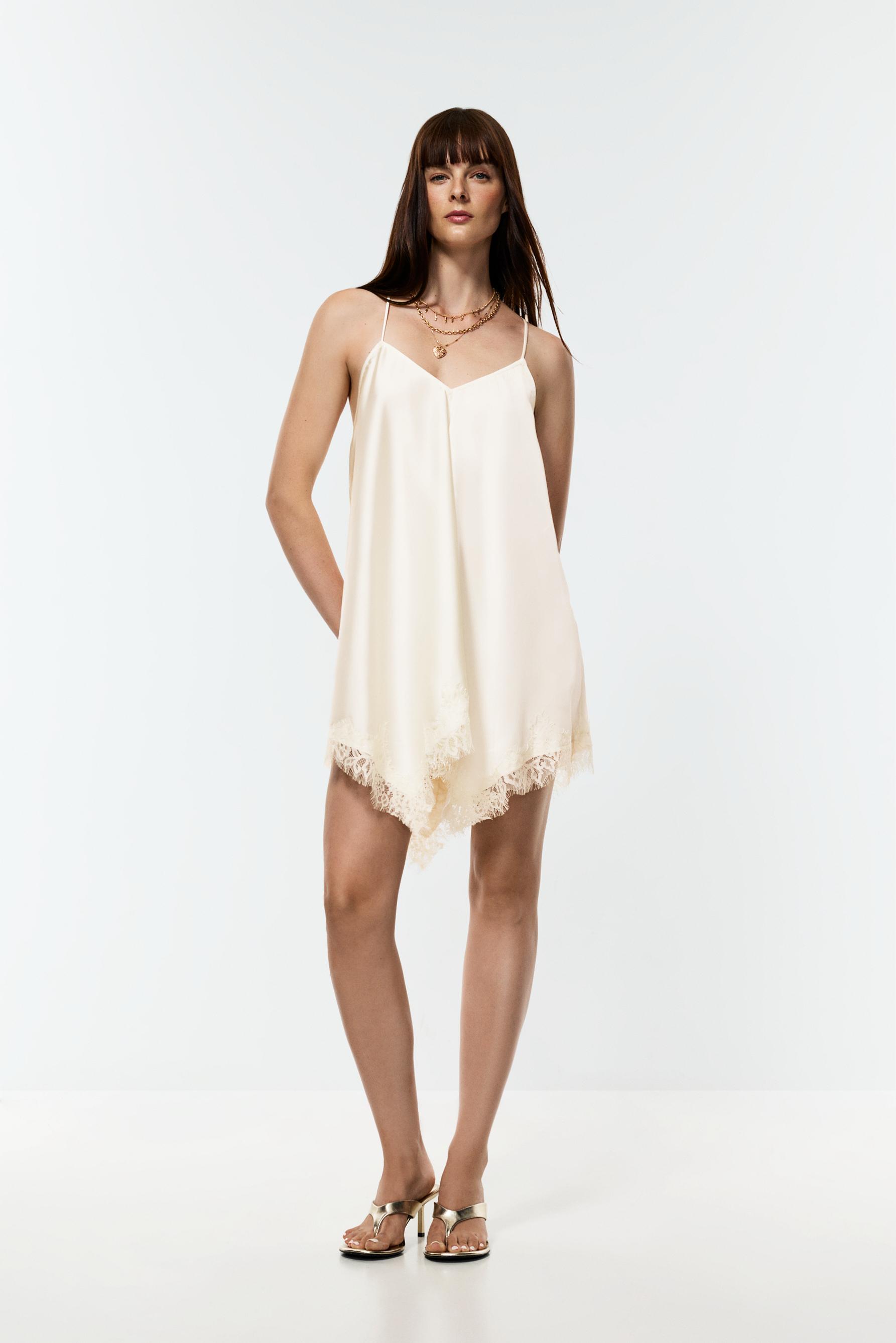 Vestido corto lencero asimétrico