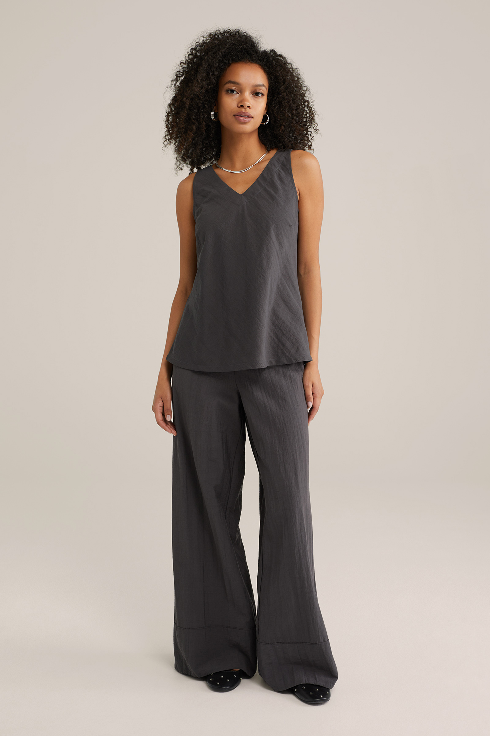 Dames singlet met strik