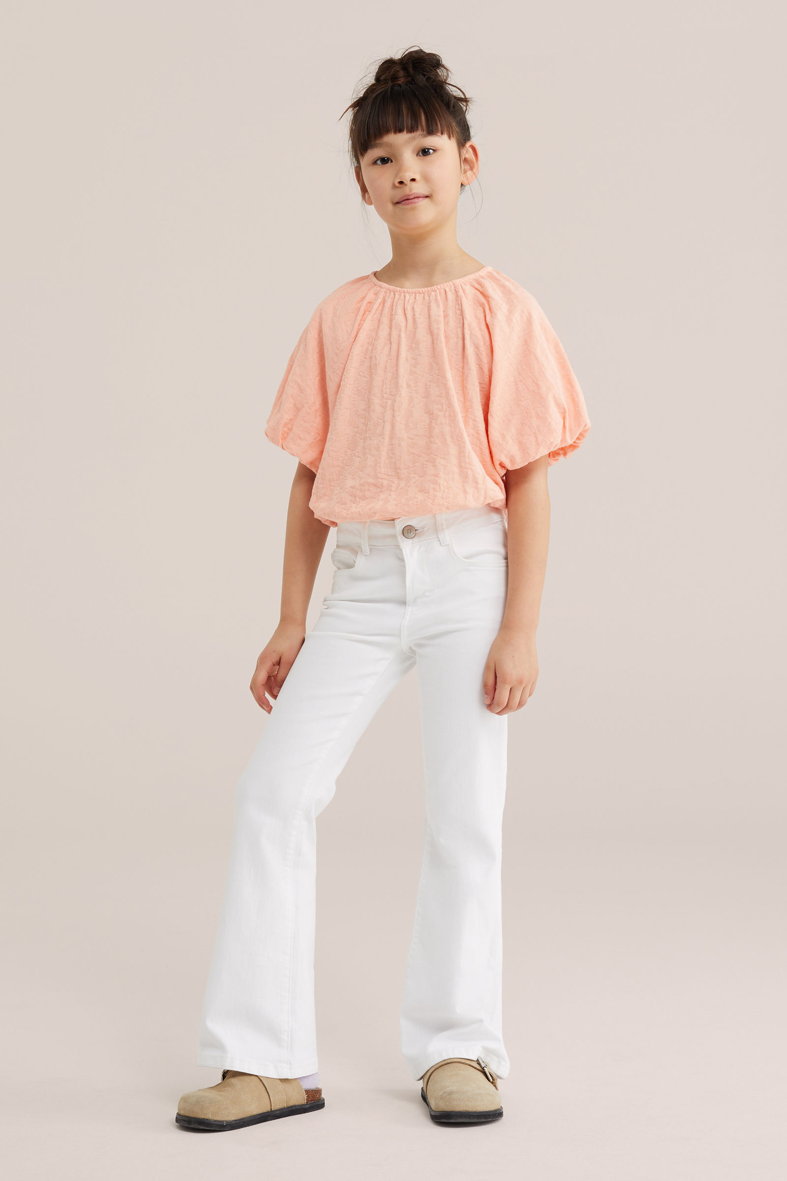 Meisjes top met structuur en ballonmouwen