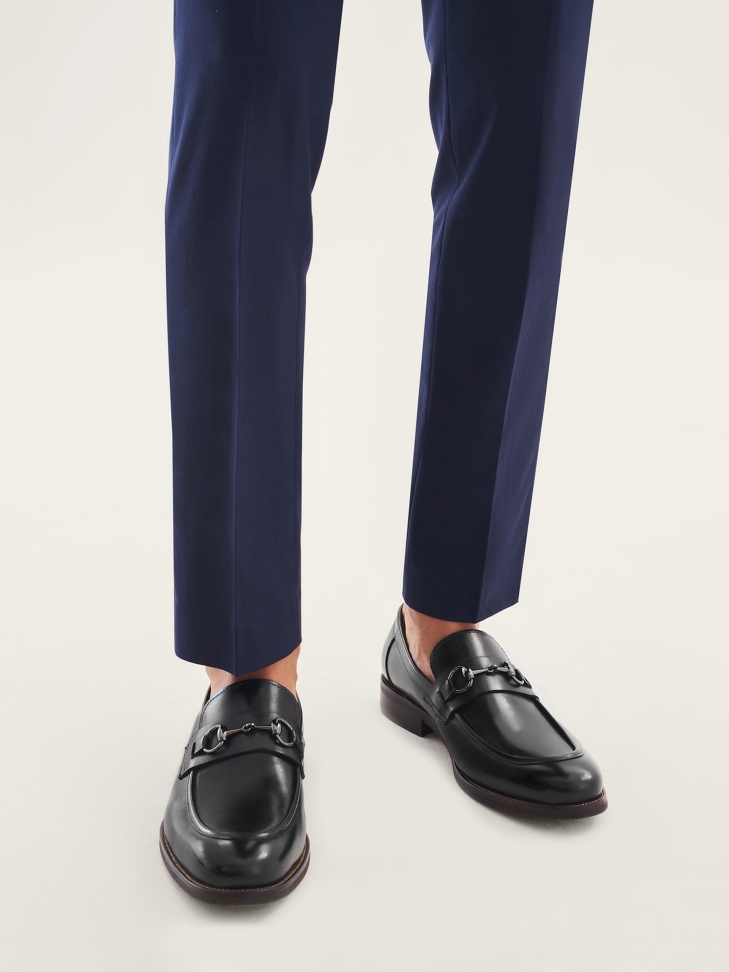 Men's elegant black loafers with metal decoration