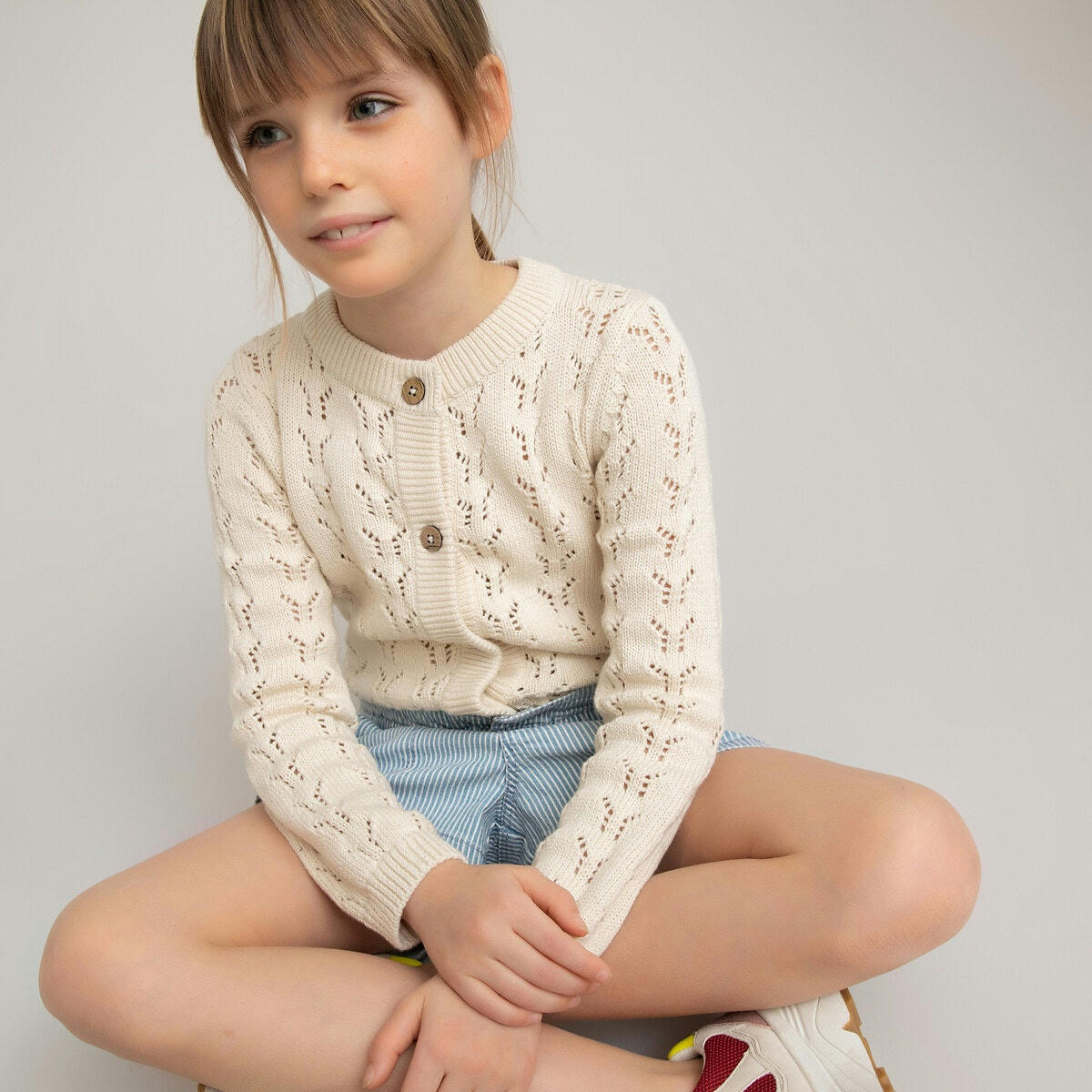 Gilet boutonnée en maille ajourée