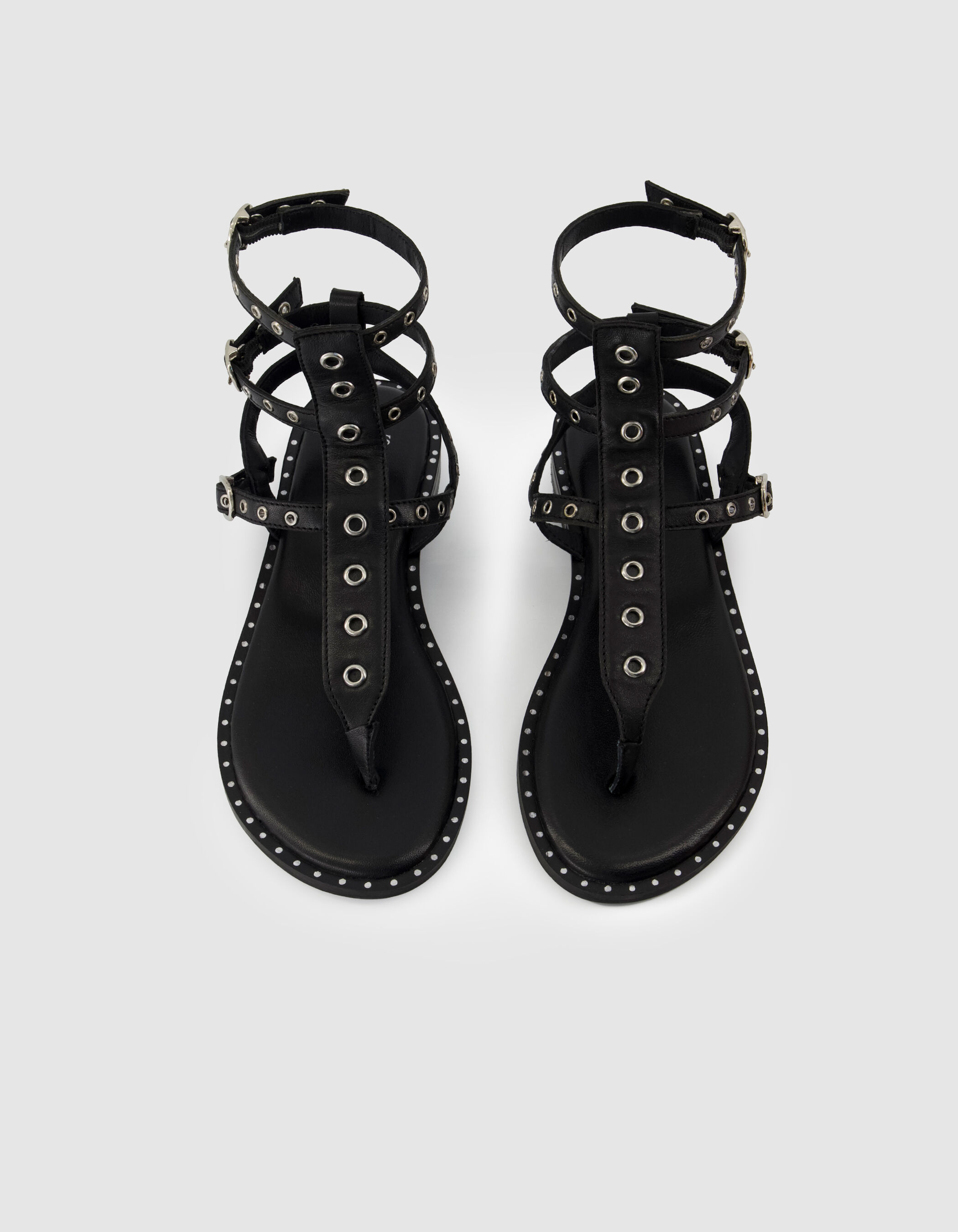 Sandales spartiates noires plates cuir Femme