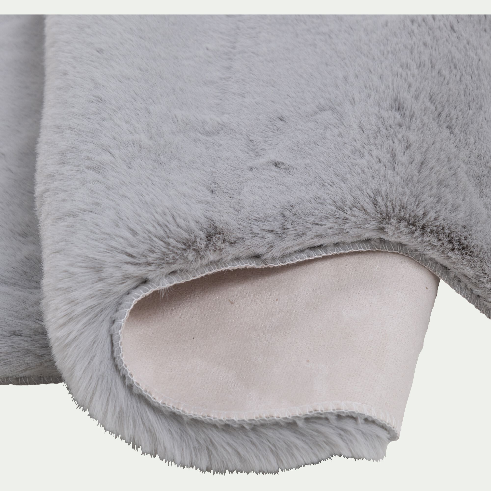 JOUVE - Tapis imitation fourrure - gris 60x90cm