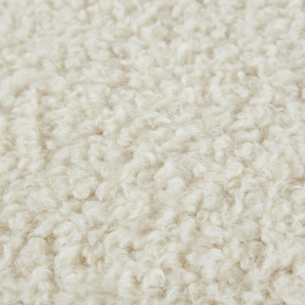 IGNACIO - Coussin rond effet laine bouclée écru D45