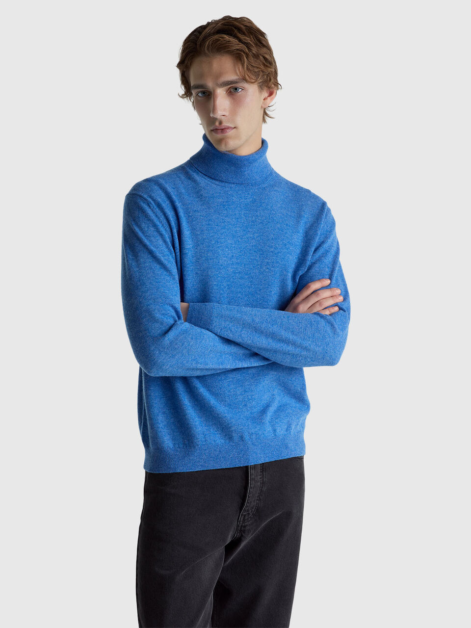 Blue m&eacute;lange turtleneck in pure Merino wool