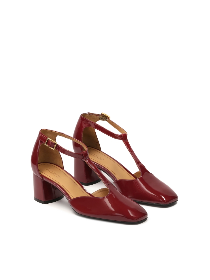 Maroon pumps with semi-open patent leather upper