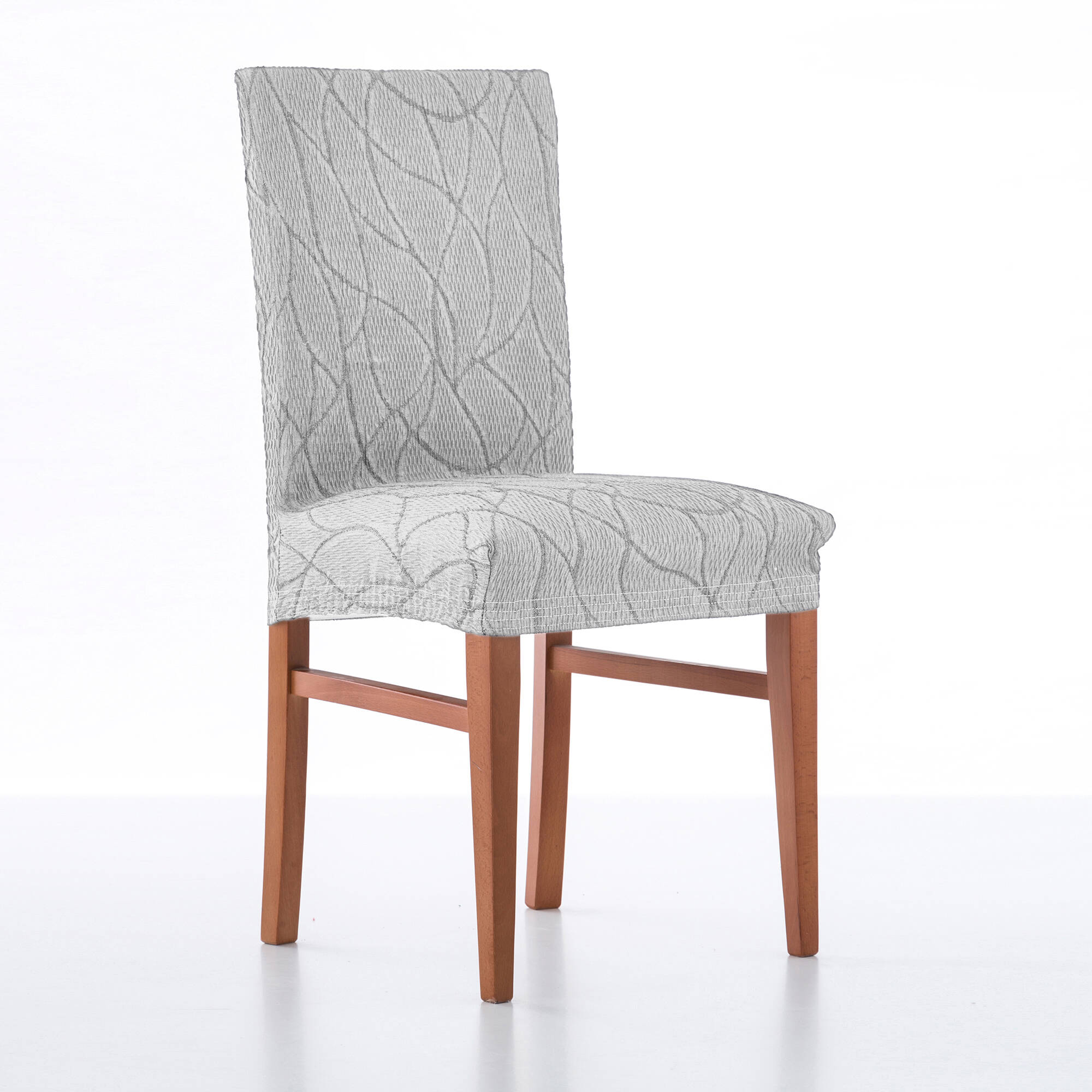 Housse intégrale extensible motif jacquard "serpentins" spéciale chaise