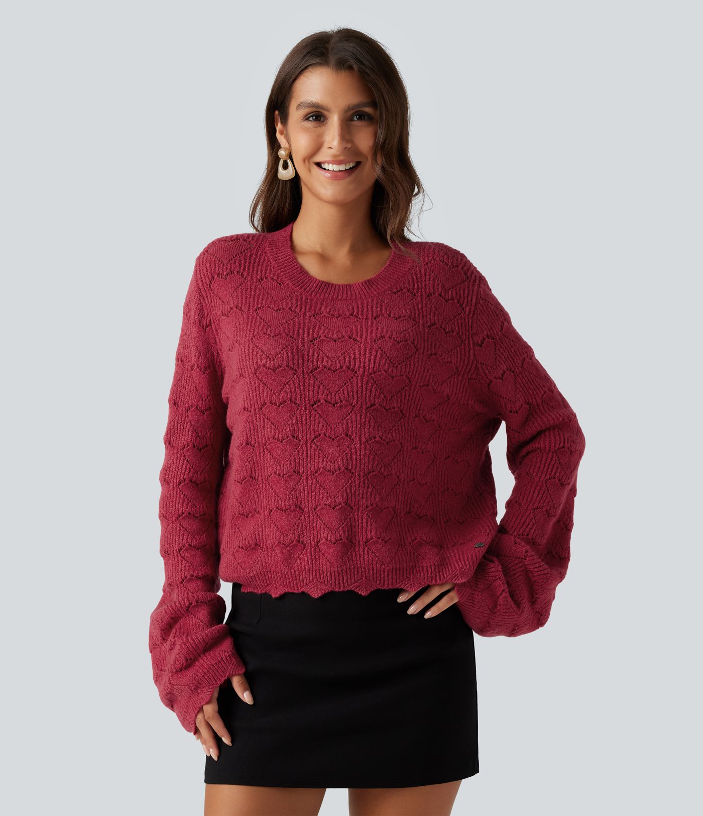 Pull à encolure arrondie, épaules tombantes et manches longues