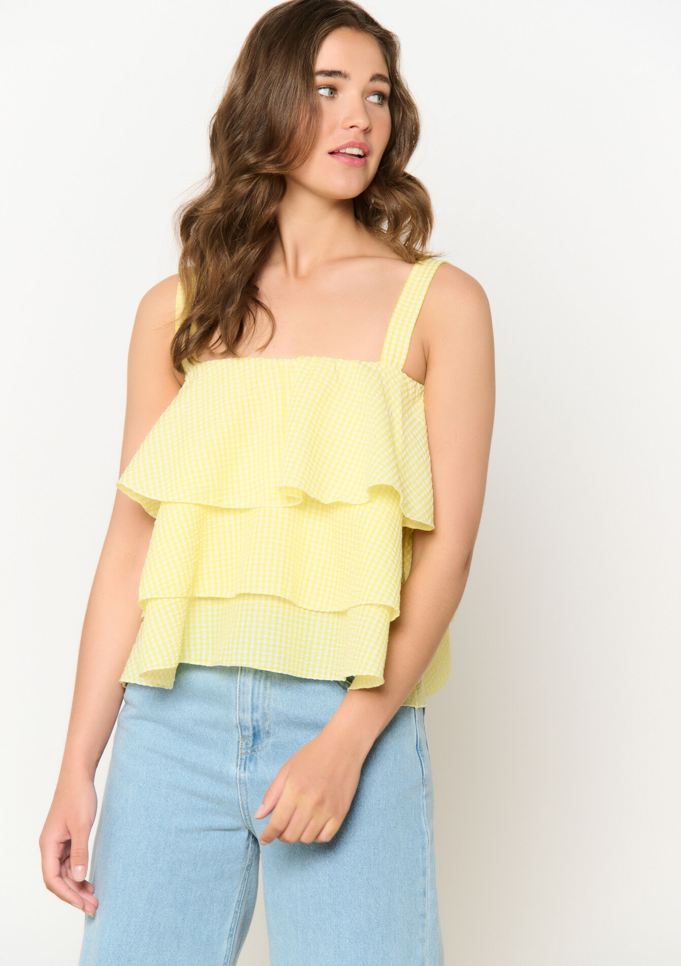 Geruite volantenblouse