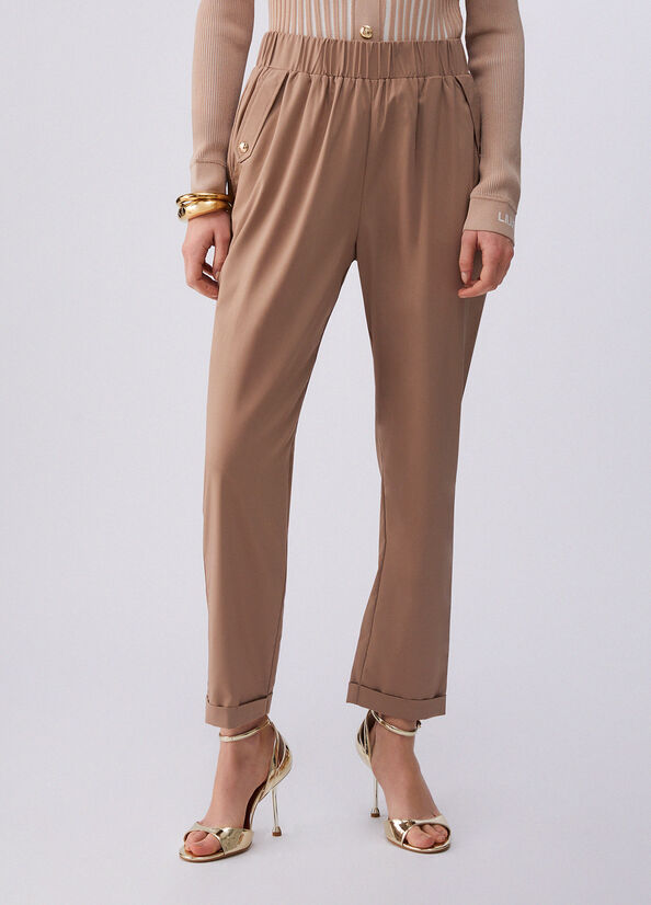 Pantaloni slim fit con risvolto