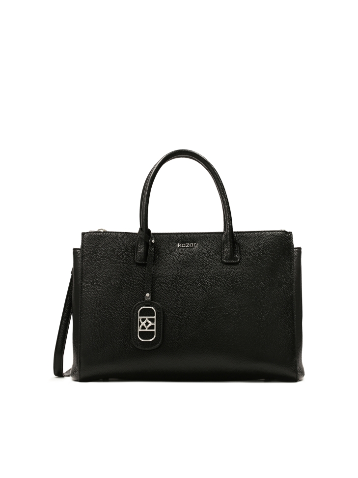 Capacious leather handbag in business style