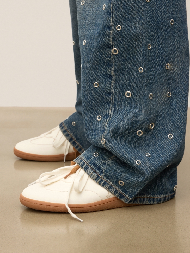 White natural leather sneakers with black heel counter