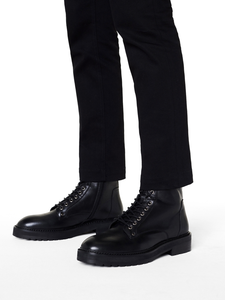 Black leather boots in military style