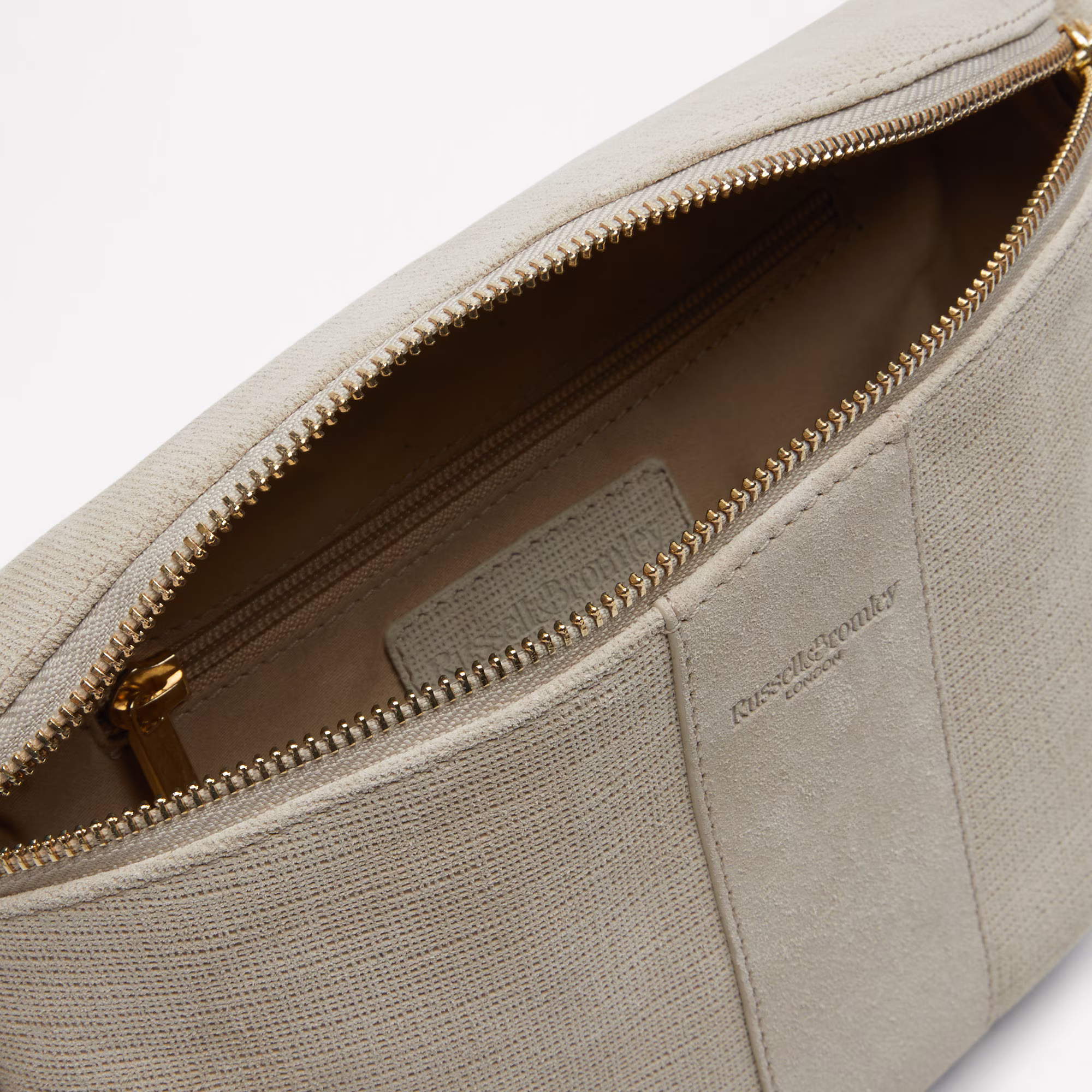 Rotate<br>Curved Crossbody Bag