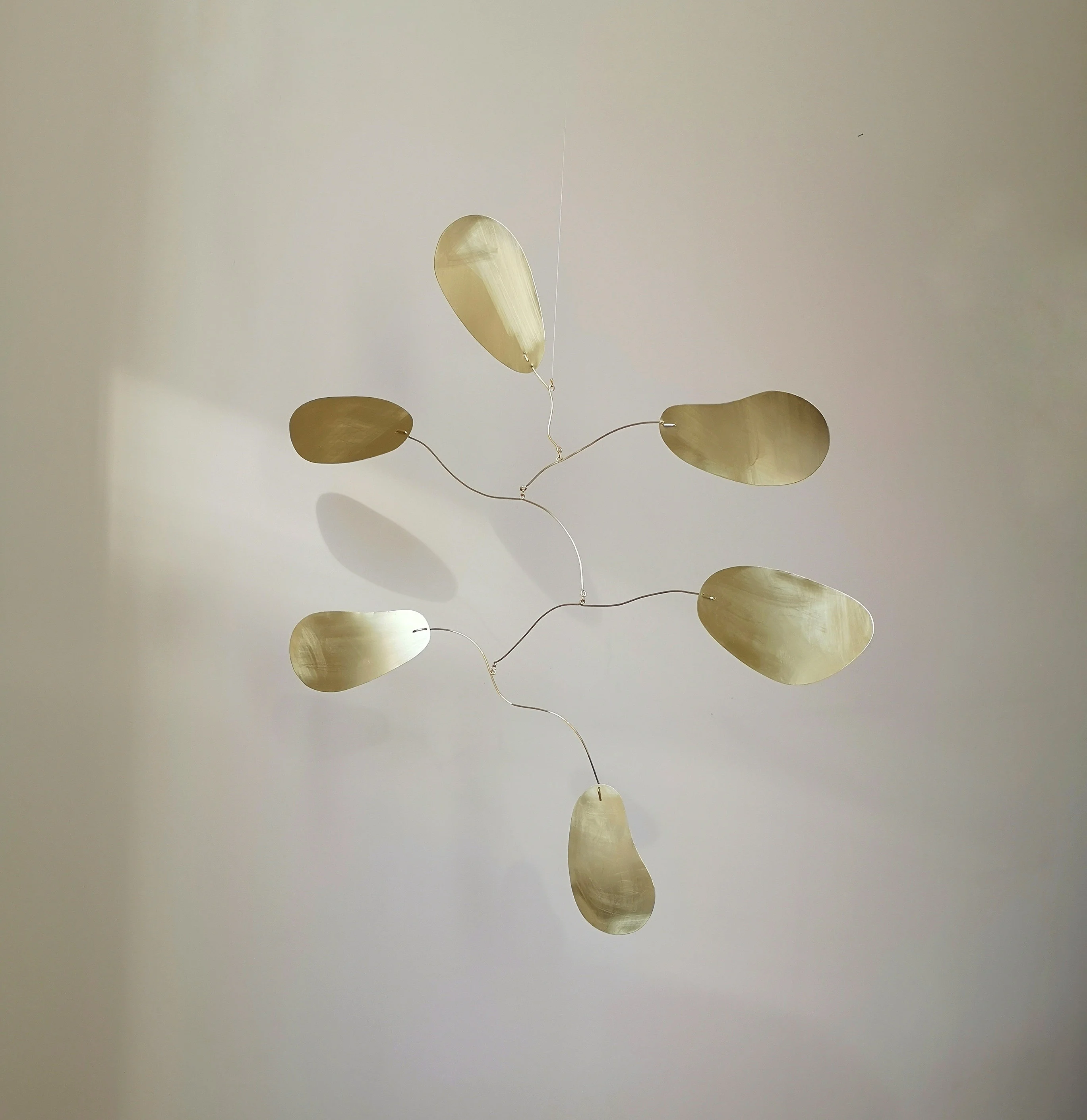Brass kinetic mobile. Mid-century modern hanging sculpture. Gold metal wall art