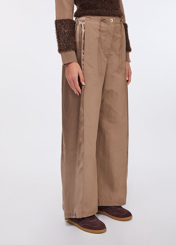 Pantaloni jogging in nylon e raso