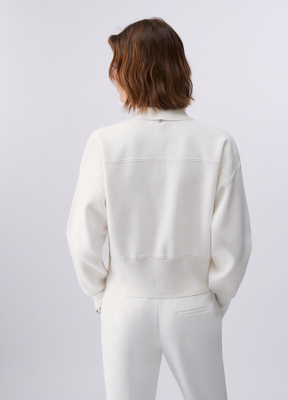 Giacca in maglia con bottoni gioiello