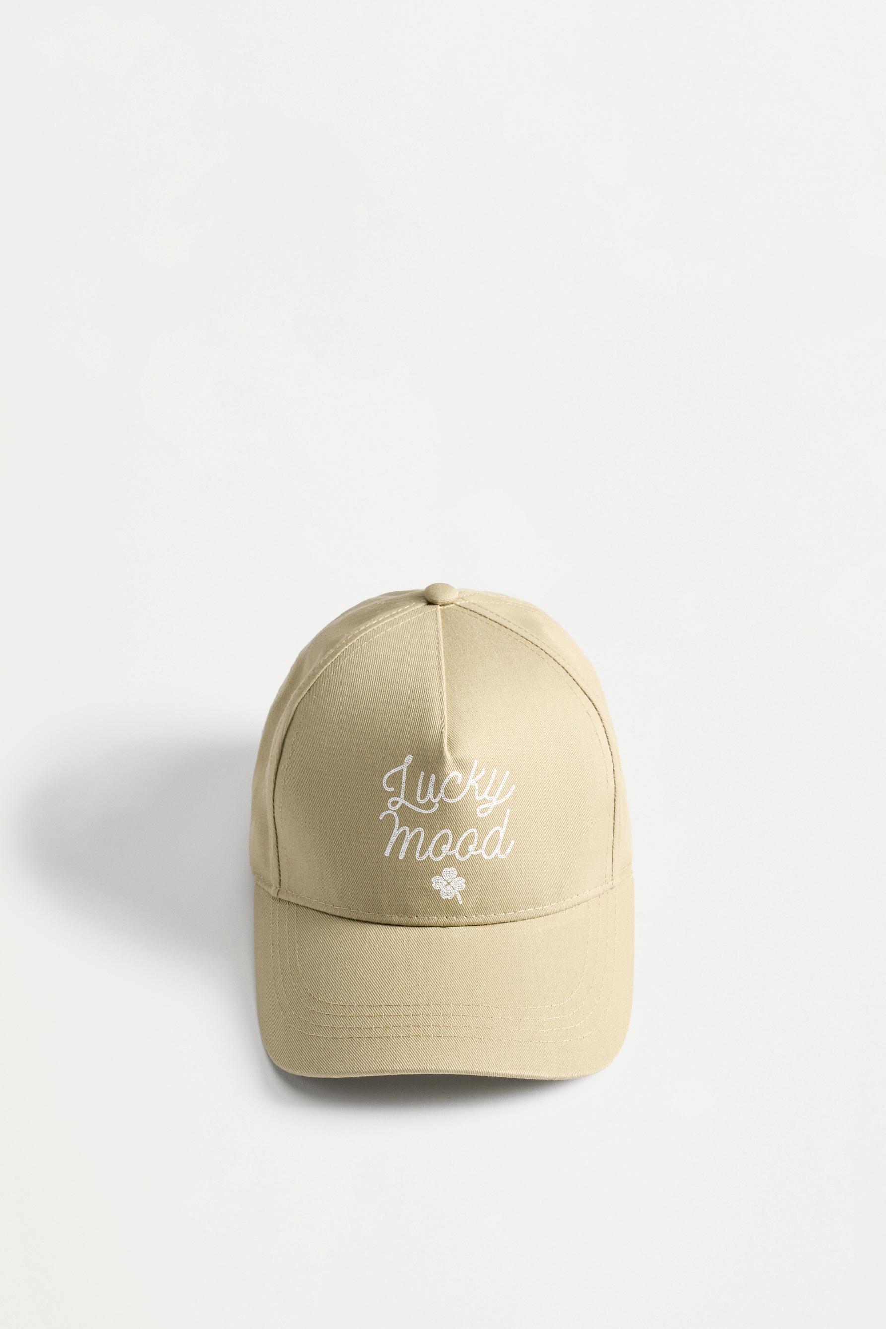 Gorra texto y flor