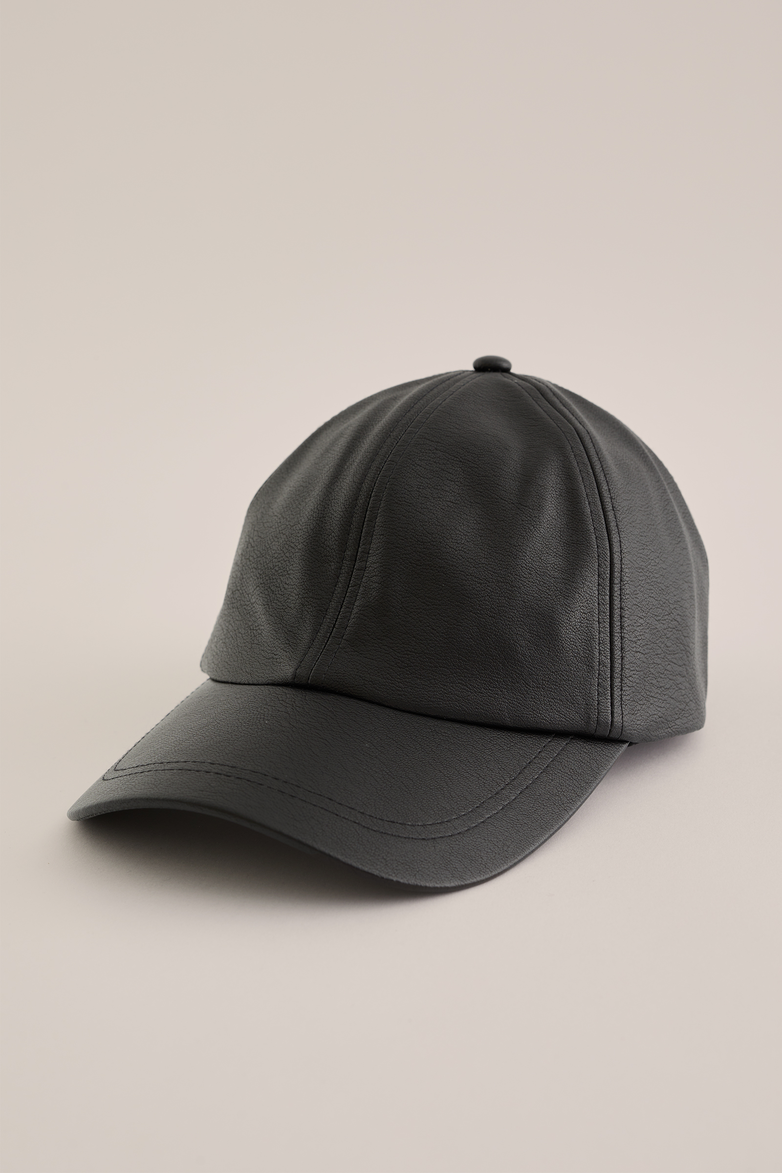 Dames pet van imitatieleer