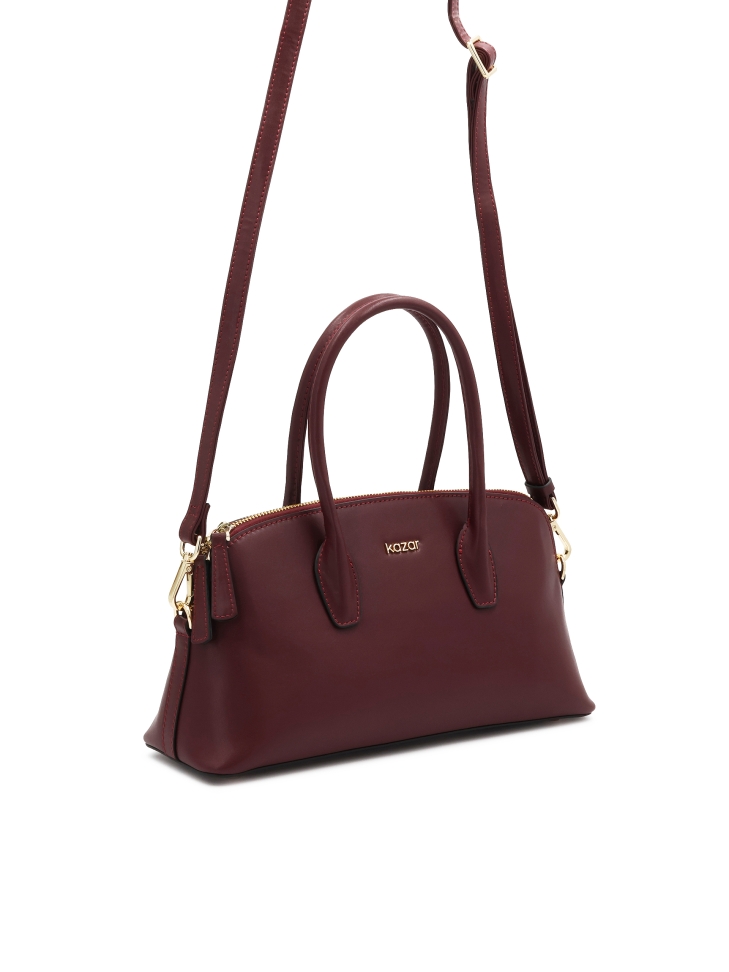 Stiff bag made of burgundy natural leather