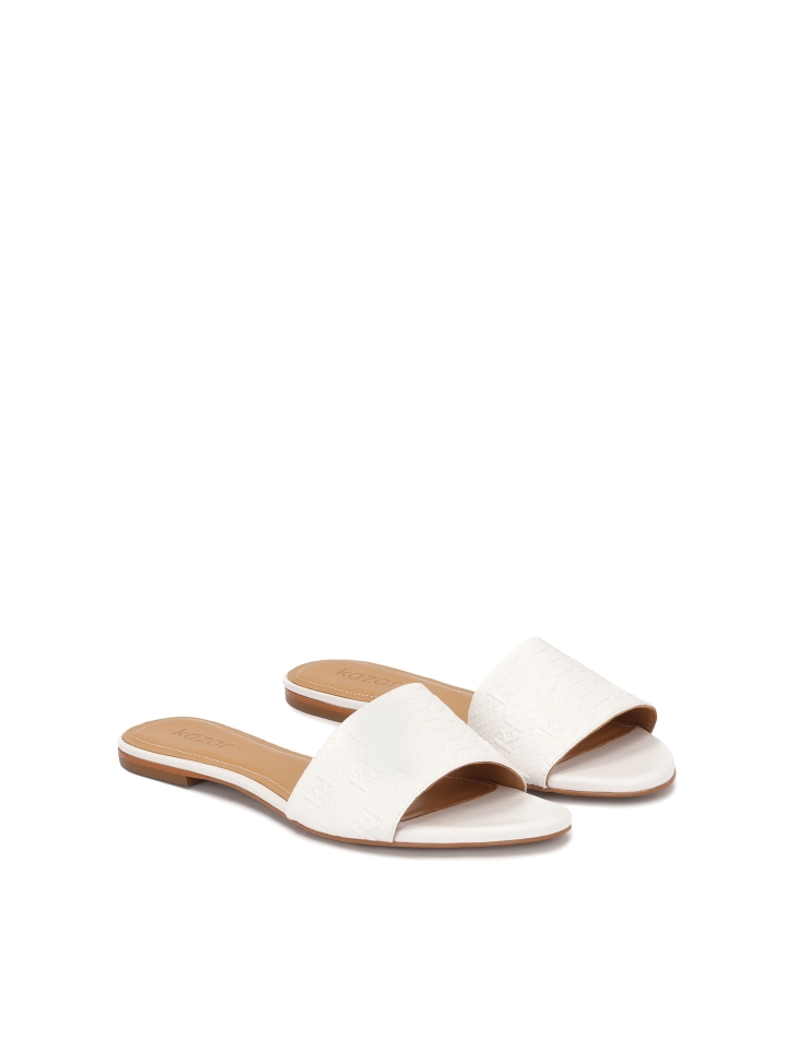 White embossed leather flat slides