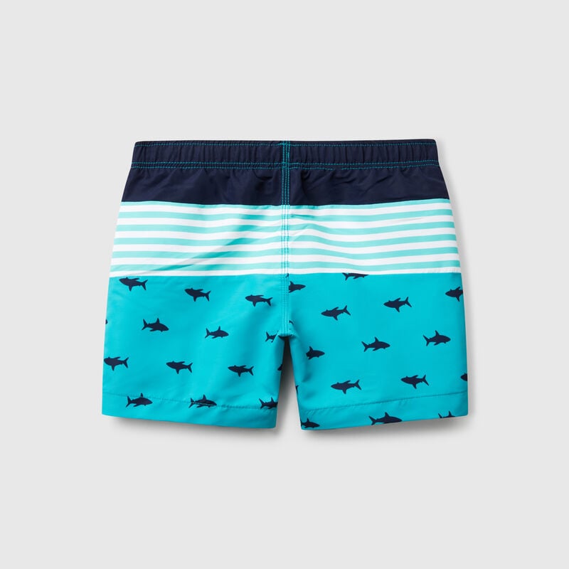 Swim trunks with stripes and sharks