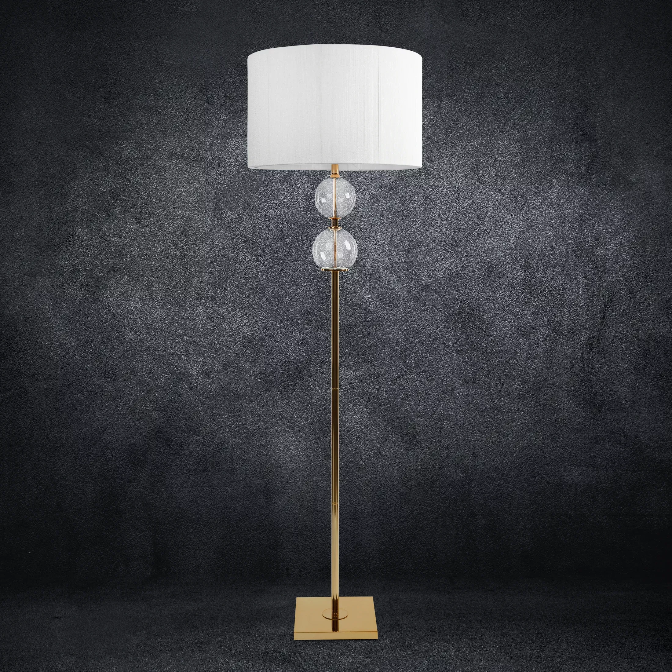 Lampa stojąca do pokoju biało, złota ARIANA na podstawie łączącej szkło metal i abażur z matowej nici