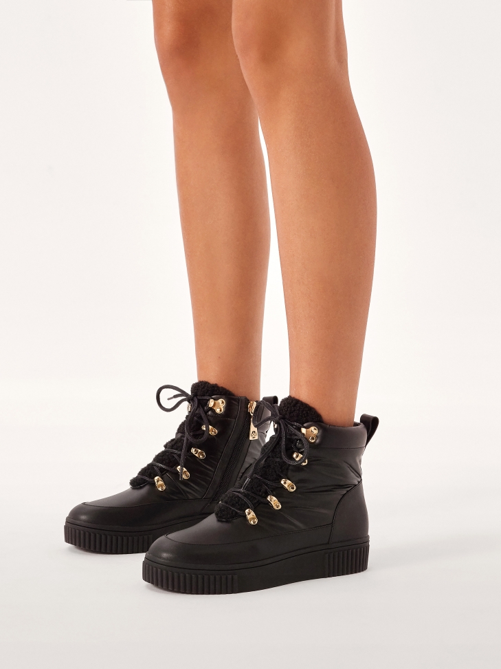 Black boots with high leather upper