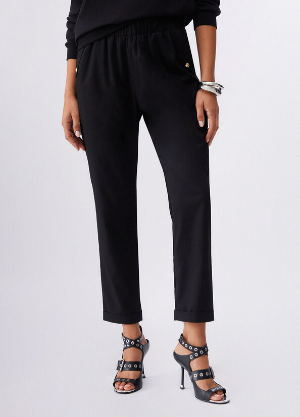 Pantaloni slim fit con risvolto