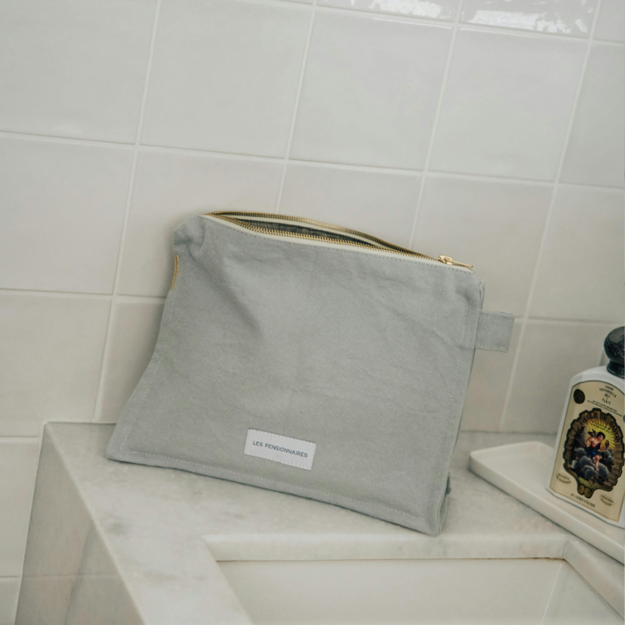 - Trousse de toilette en toile de coton bio bleu subtil