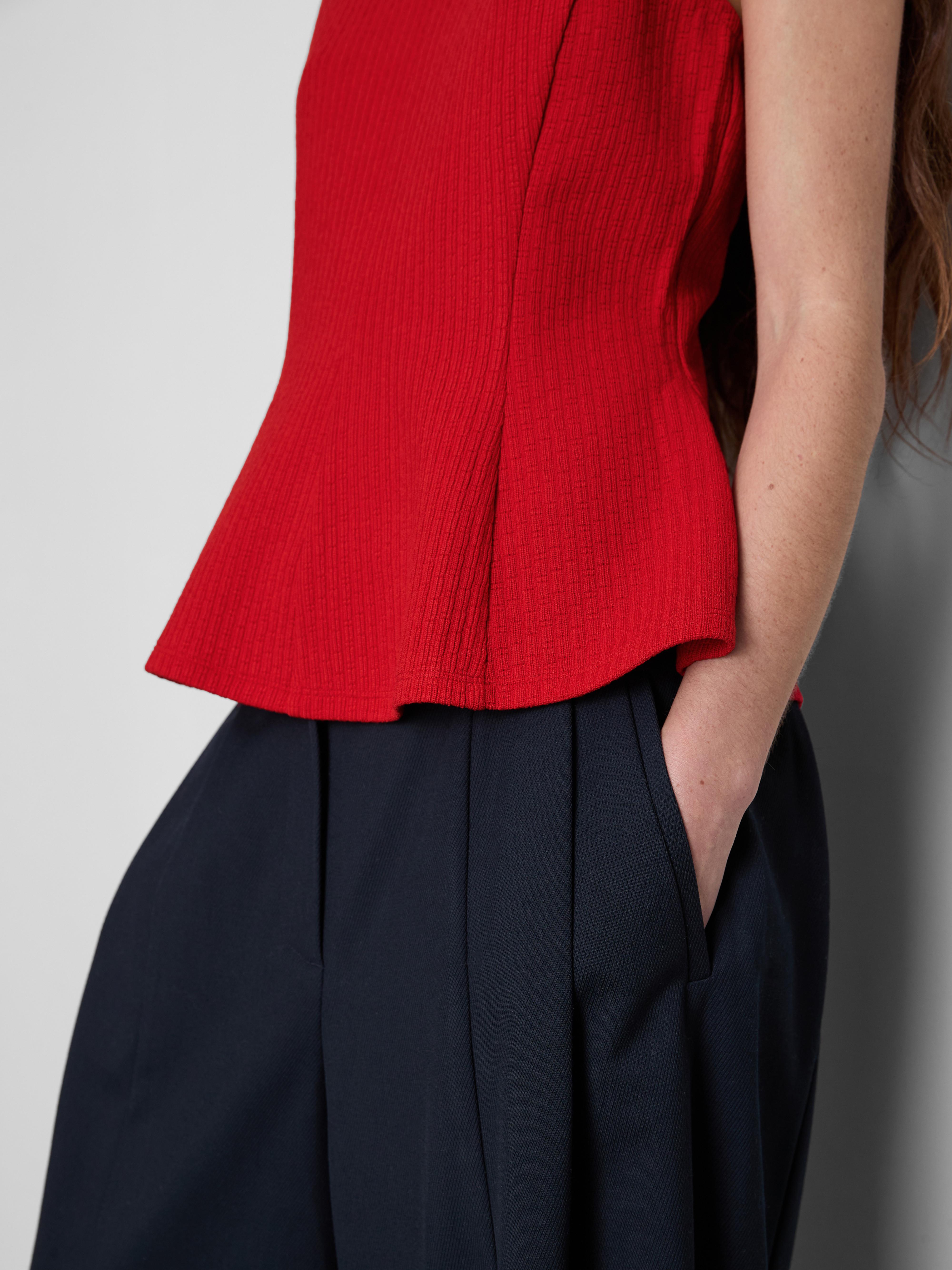 Sleeveless Peplum Top