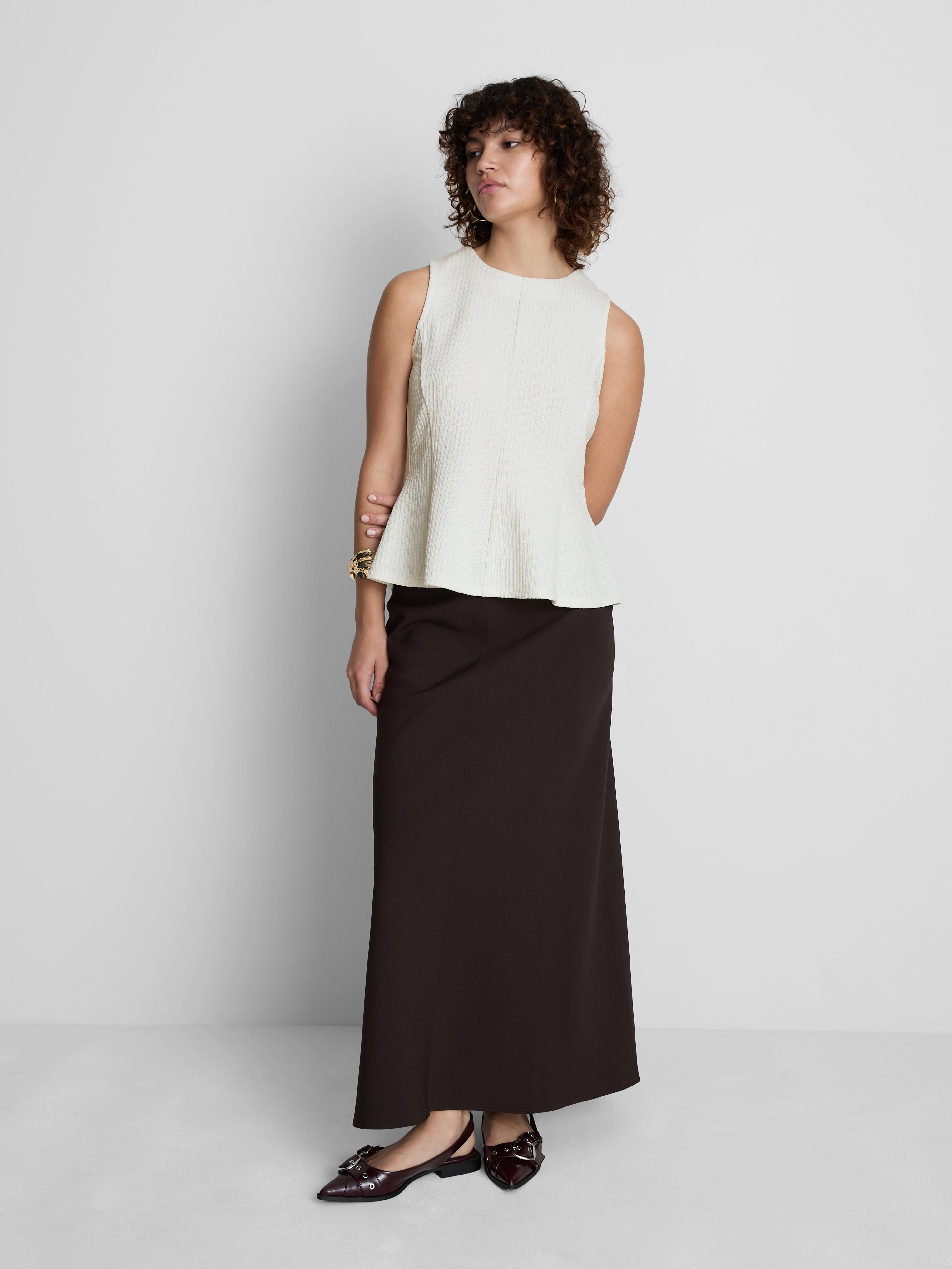 Sleeveless Peplum Top