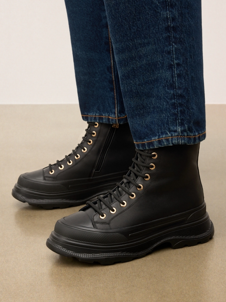 Black boots on a sport sole