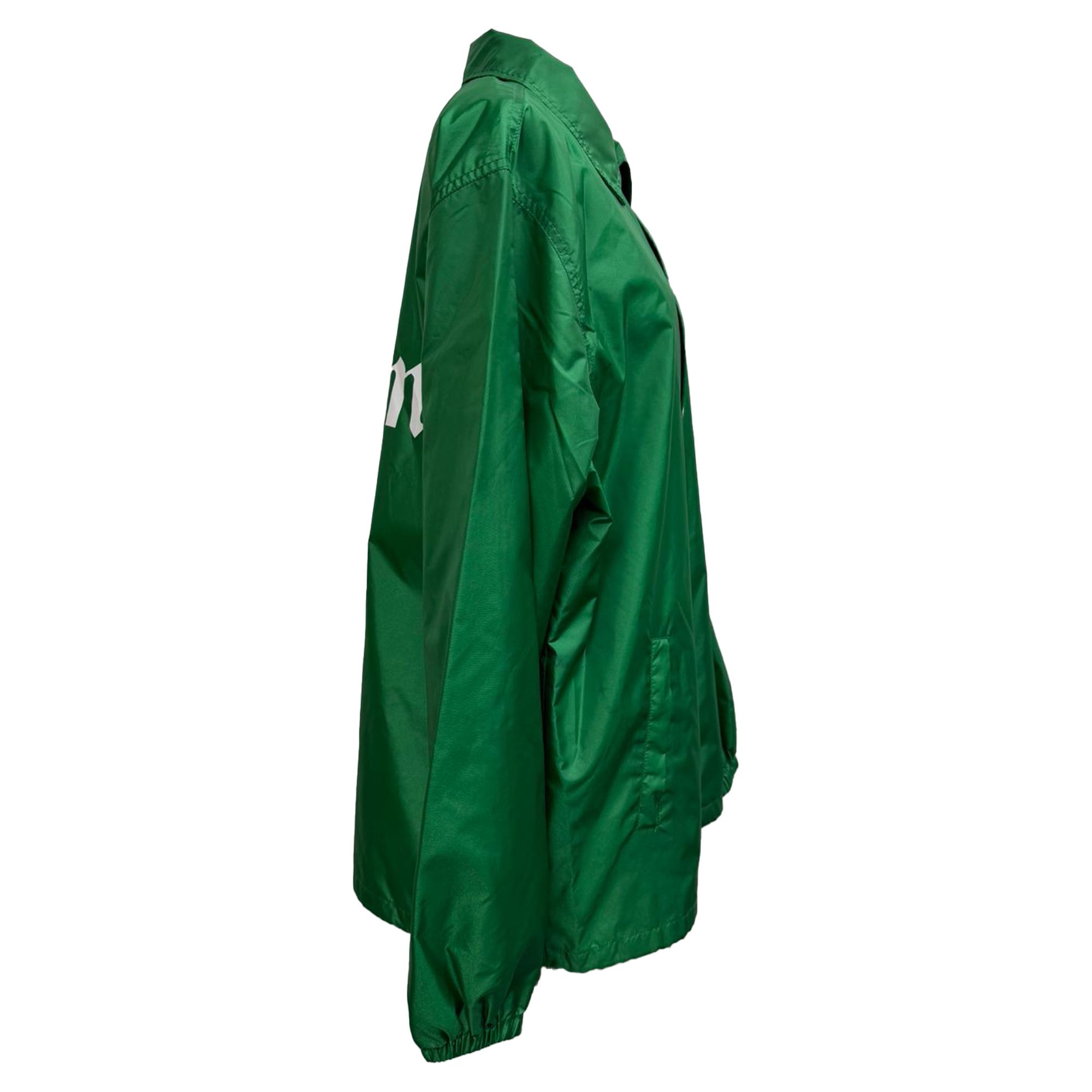 Celine Preloved Logo-Print Coach Jacket in Green Polyamide